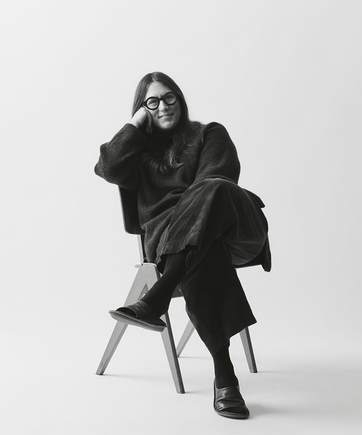Portrait of a founder seated thoughtfully